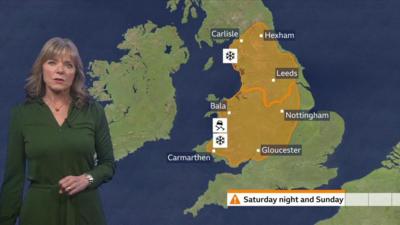 BBC Weather presenter Louise Lear stands in front of a map showing a lot of northwest England expecting snow this weekend.