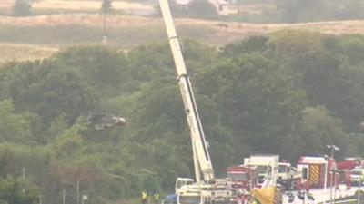 Crane removing wreckage from the Shoreham Airshow crash site