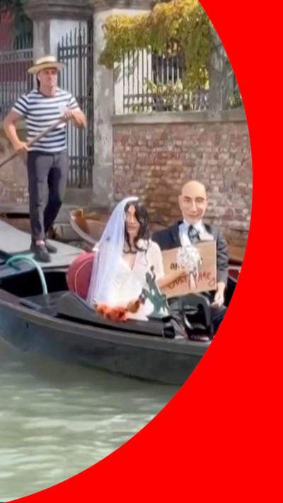 Mannequins of Jeff Bezos and his bride-to-be Lauren Sanchez in a gondola