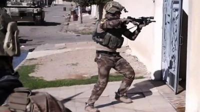 Ayman Oghanna goes on patrol with the Iraqi government forces as they attempt to sweep the area for civilians.