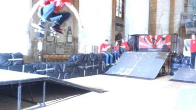 Skateboarding inside Gloucester Cathedral