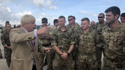 Boris Johnson meets British soldiers in Barbados