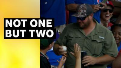 Fan at MLB catching ball in crowd