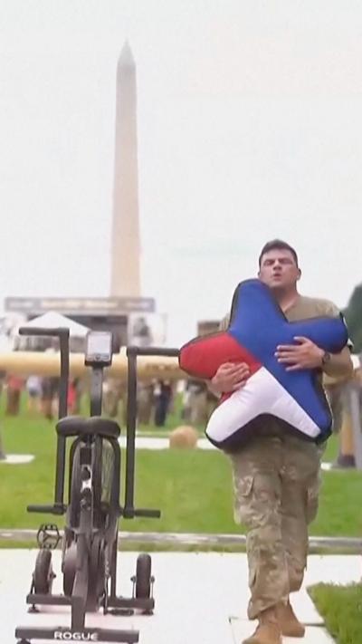 A soldier walks on the National Mall