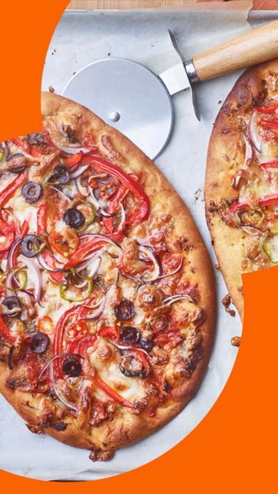 Top-down view of a naan-based pizza freshly cooked 