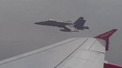 Fighter jet escorting EasyJet flight