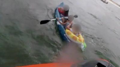 Girls on inflatable boat