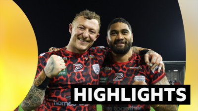 Leigh's Josh Charnley and Ricky Leutele celebrate reaching the Super League play-offs