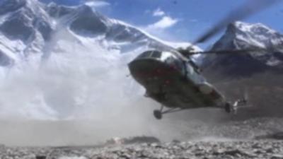 Helicopter landing in Himalayas