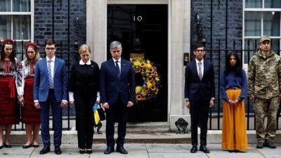 British Prime Minister Rishi Sunak has led the nation in silence from Downing Street