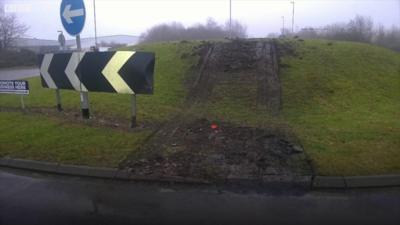 Tyre marks on roundabout