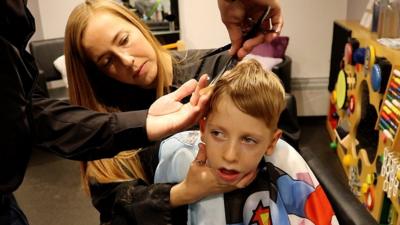 Oscar,5, having a hair cut.