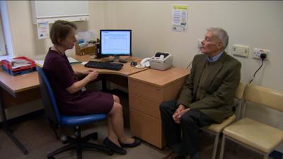 Consultation between a doctor and a patient