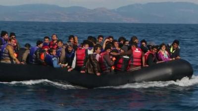 Migrants on boats off the shores of Lesbos