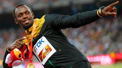 Usain Bolt of Jamaica, gold medal, reacts as he poses on the podium after the men's 200 metres event during the 15th IAAF World Championships at the National Stadium in Beijing, China, August 28, 2015.