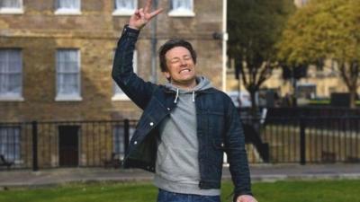Jamie Oliver celebrates after hearing the news of the Chancellor's sugar tax