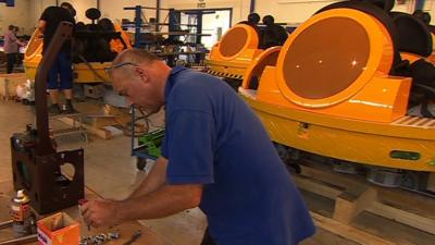 A man working in the Mack Rides factory in Germany