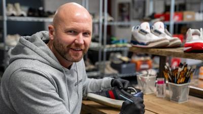 Chris Ward in his trainer cleaning shop