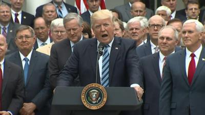 US President Donald Trump and House Republicans celebrated a vote on a healthcare bill at the White House.