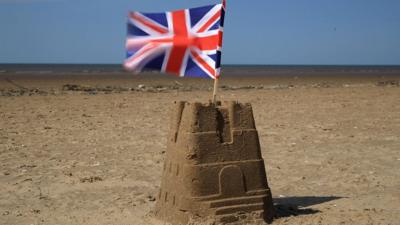 Sandcastle with a Union Jack