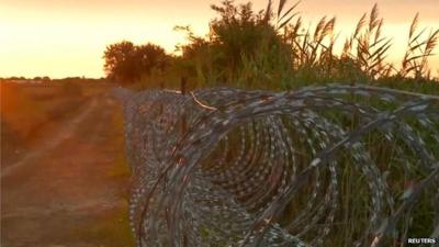 Close up of Hungary's wire fence in Roszke, on its border with Serbia