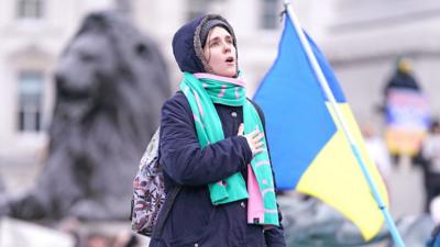 People take part in a demonstration in Trafalgar Square, London, to denounce the Russian invasion of Ukraine