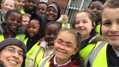 Some pupils taking part in the spring clean.