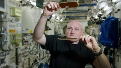 Scott Kelly plays ping pong in space