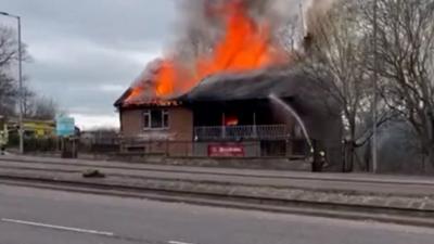 Eyewitnesses captured images of smoke billowing from the Bullfrog Bar and Lounge on Shields Road.