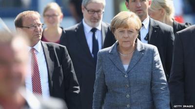 German chancellor Angela Merkel visiting a shelter for asylum seekers in Heidenau where far-right protesters clashed with police at the weekend