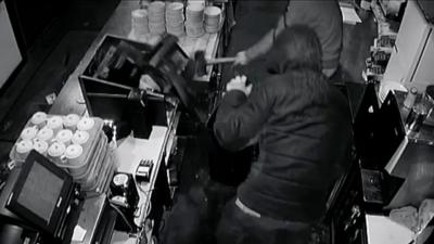 Thieves breaking a cafe till