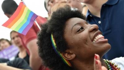 Woman celebrates outside Supreme Court