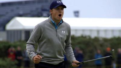 Jordan Spieth celebrates holing a mammoth putt at the 16th