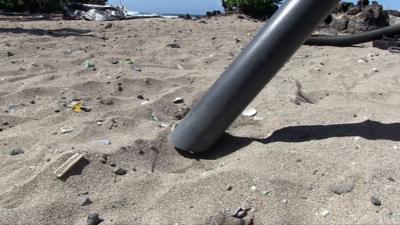 Engineers build vacuum to clean microplastics in sand