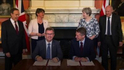 The DUP-Tory pact being signed