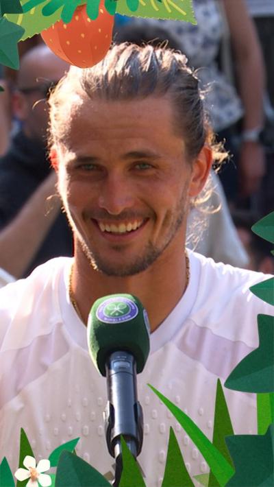 Alexander Zverev smiling in on-court interview