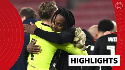 Substitute Niall Ennis celebrates with goalkeeper Simon Moore