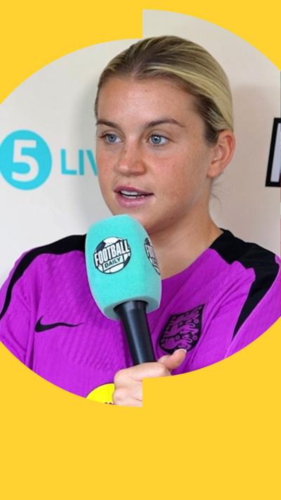 Alessia Russo holding a Football Daily microphone and speaking