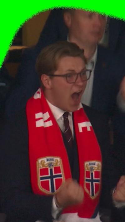 Prince Sverre Magnus celebrates Norway's first goal