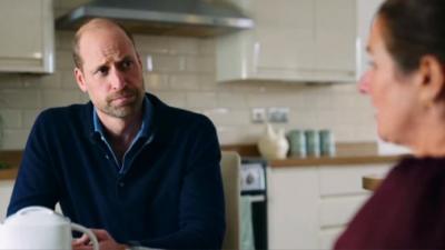 Prince William chatting with Rhian Mannings at her Cardiff home