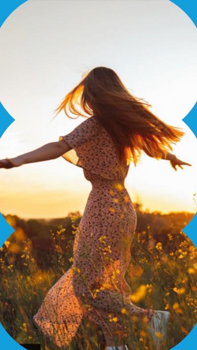 Figure in silhouette lit a golden orange by the Sun