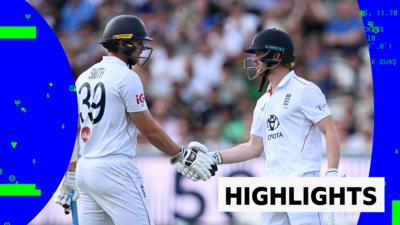 England batters Jamie Smith and Jordan Cox shake hands on the crease