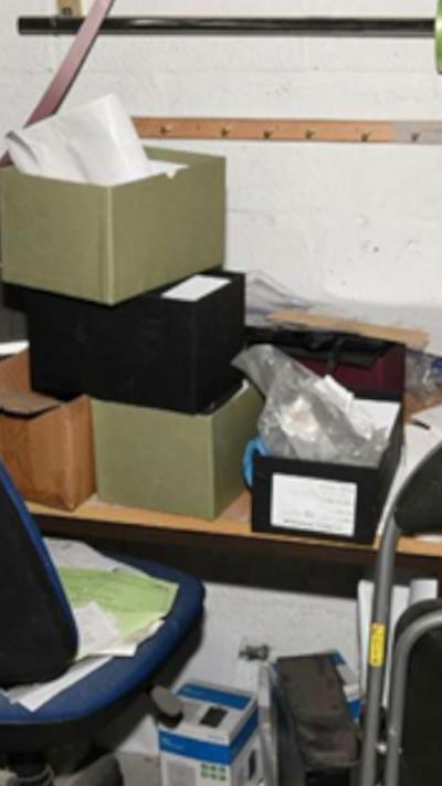 Boxes piled high on a desk inside funeral home