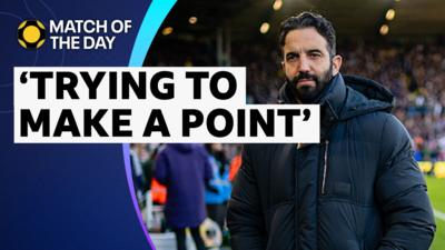 Ruben Amorim in coat on the pitch following draw to Leeds.