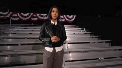 Samira Hussein standing on an empty riser