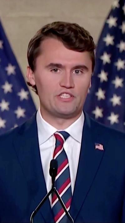 Charlie Kirk in suit