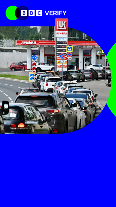 Cars line up in a long queue to enter a petrol station in Russia 