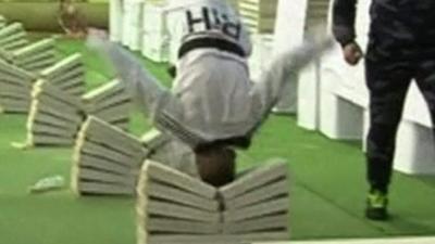 Bosnian taekwondo champion Kerim Ahmetspahic has set a new record for crushing concrete blocks with his head.