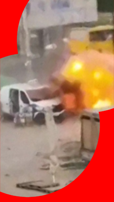 A van with an explosion next to it