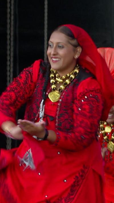 Female Indian dancer in a red outfit